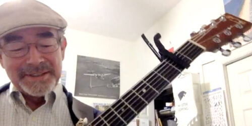man and guitar
